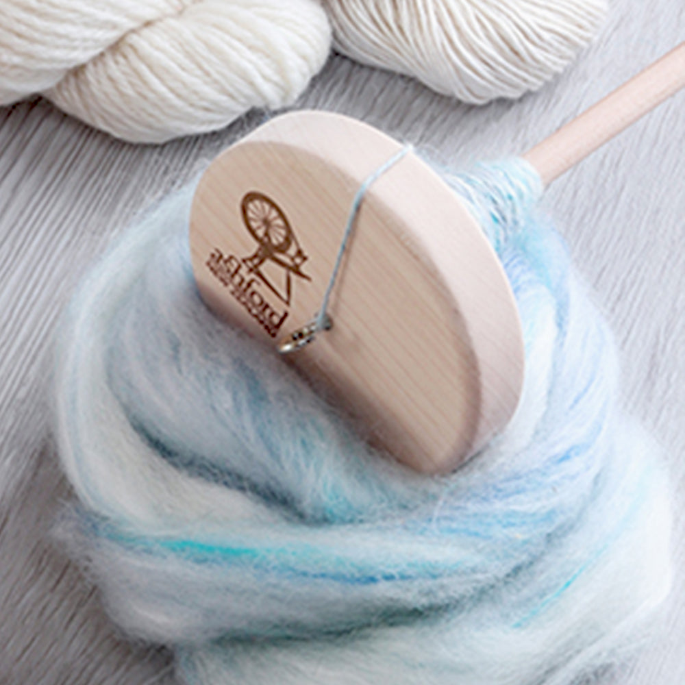 Ashford drop spindle with handspun yarn and roving – spinning by hand