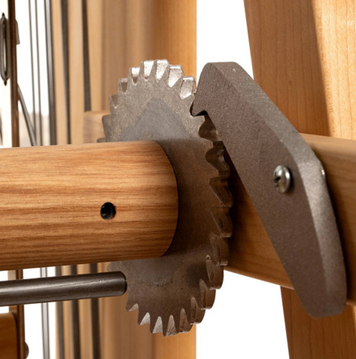 Detail of cloth beam with ratchet on Harrisville Designs floor loom