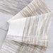 Handwoven neutral fabric showing texture and color variation of Ashford Caterpillar Yarn.