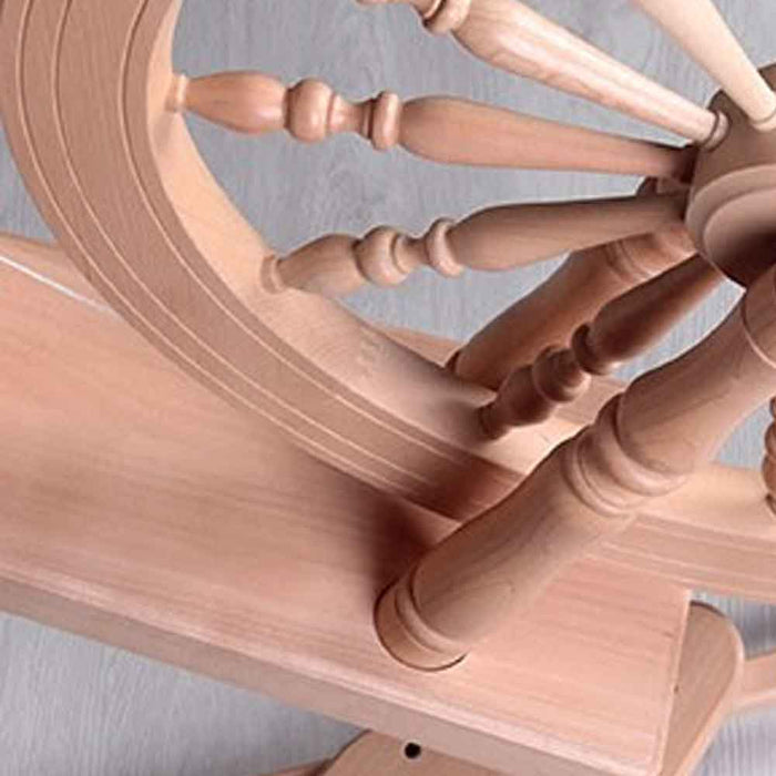 Detail of the Ashford Elizabeth 30 inch spinning wheel showing the large Saxony wheel and beech wood construction