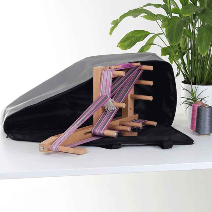 Ashford Inkle loom being placed into its carry bag
