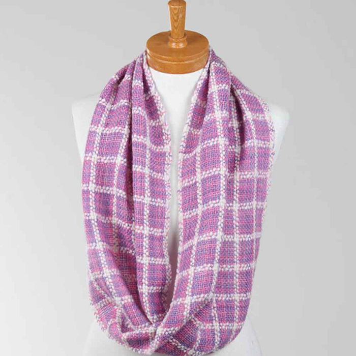 Ashford Weaving Kit 1 – dyed Lattice Scarf worn in an infinity loop style, handwoven with Ashford Merino/Viscose/Linen and Wool yarns.