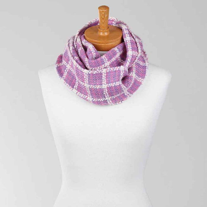 Ashford Weaving Kit 1 – dyed version of the Lattice Scarf in pink and violet tones, woven with Ashford Merino/Viscose/Linen and Wool yarns using Ashford Protein Dyes.