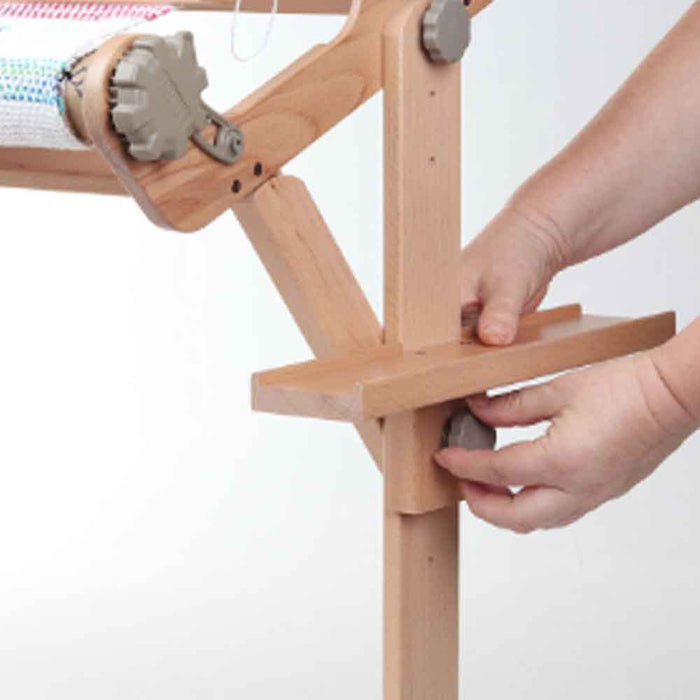 Installing Ashford loom stand accessory tray on wooden loom stand by hand
