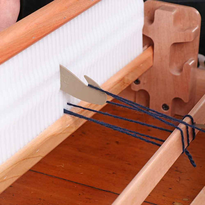 Ashford threading hook used on a rigid heddle loom