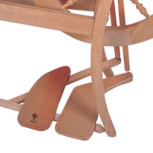Ashford double treadle kit installed on Traditional spinning wheel showing dual treadle setup