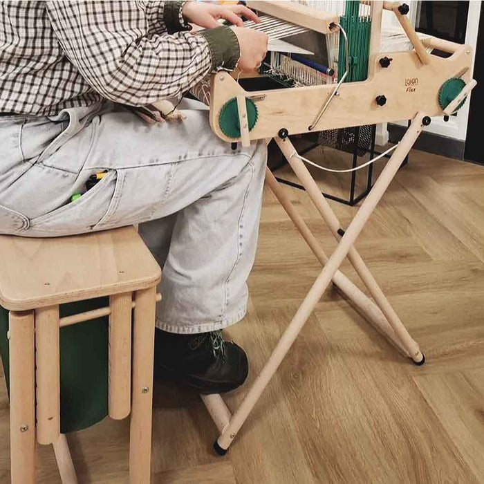 Side view of the Lojan adjustable weaving bench