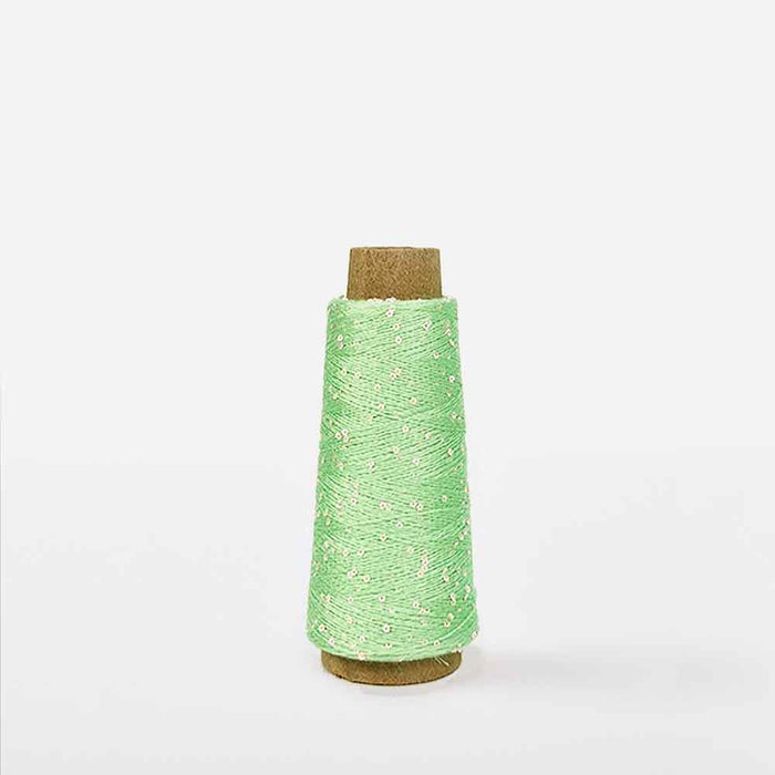 Green spool of Creative Make It Blümchen paper yarn by Rico Yarns – textured and lightweight for decorative textile projects