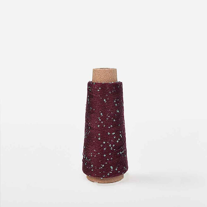 Plum spool of Creative Make It Blümchen paper yarn by Rico Yarns – textured and lightweight for decorative textile projects