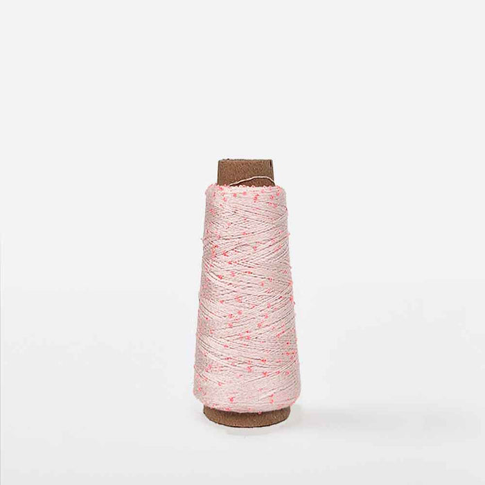Powder spool of Creative Make It Blümchen paper yarn by Rico Yarns – textured and lightweight for decorative textile projects