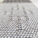Close-up showing the texture of a woven structure using