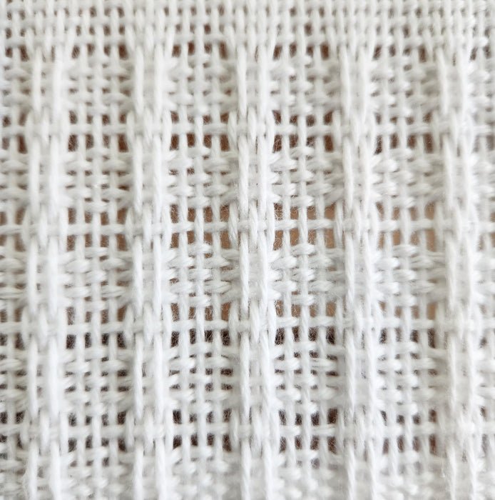 Close-up of a woven structure created with Pick up stick