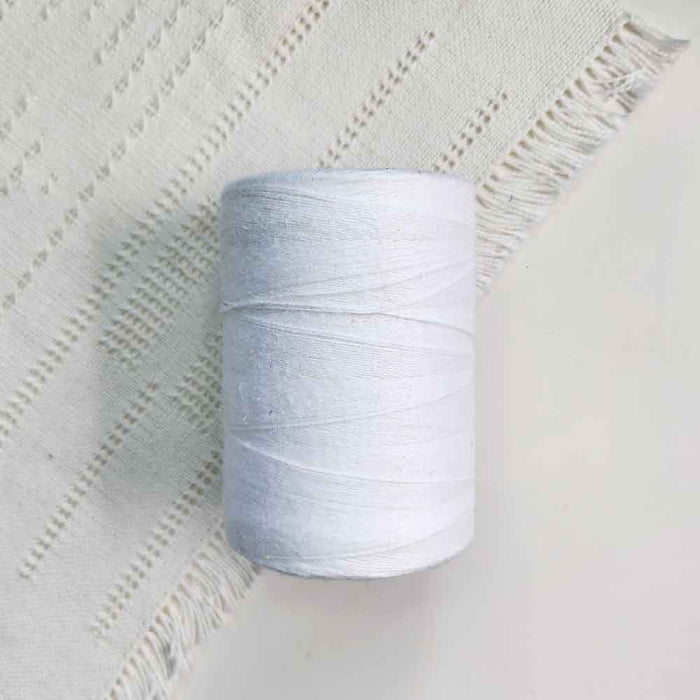 Cone of blanchi cotolin weaving yarn by Brassard