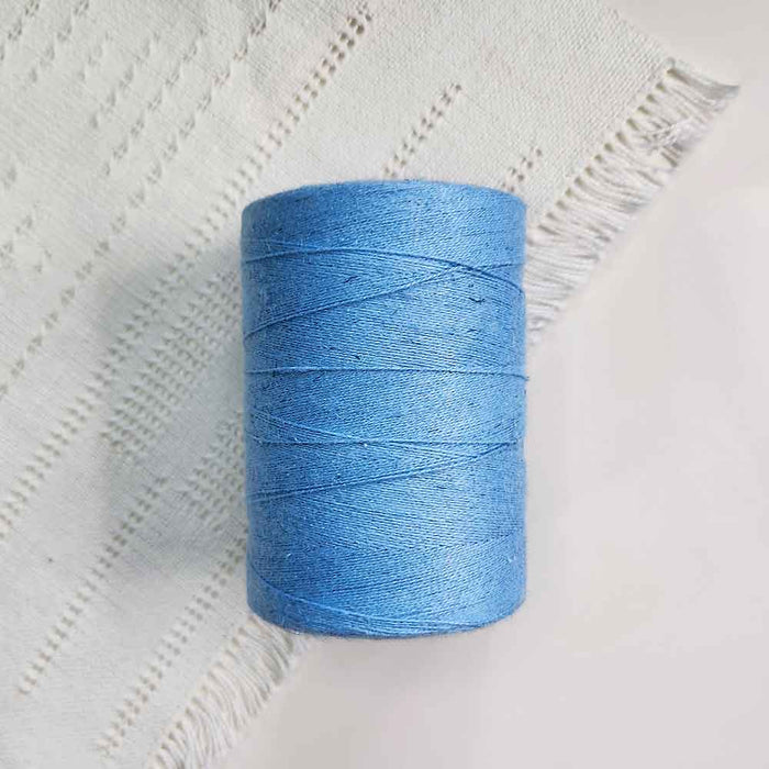 Cone of bleu pale cotolin weaving yarn by Brassard