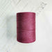 Cone of bourgogne cotolin weaving yarn by Brassard