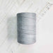 Cone of gris pale cotolin weaving yarn by Brassard