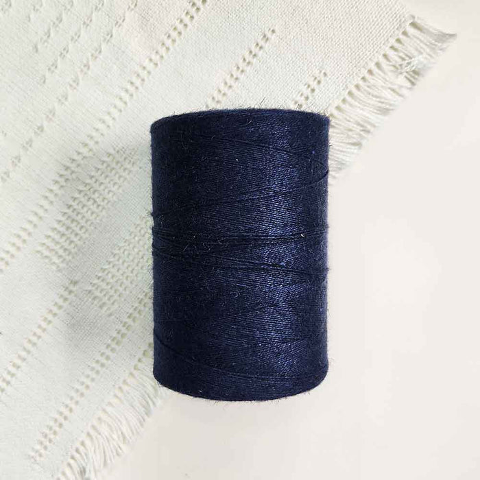 Cone of marine cotolin weaving yarn by Brassard