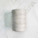 Cone of naturel cotolin weaving yarn by Brassard