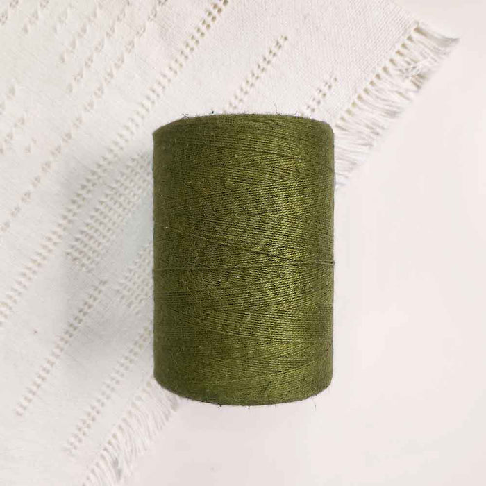 Cone of olive cotolin weaving yarn by Brassard