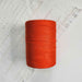 Cone of orange fonce cotolin weaving yarn by Brassard