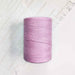 Cone of rose pale cotolin weaving yarn by Brassard