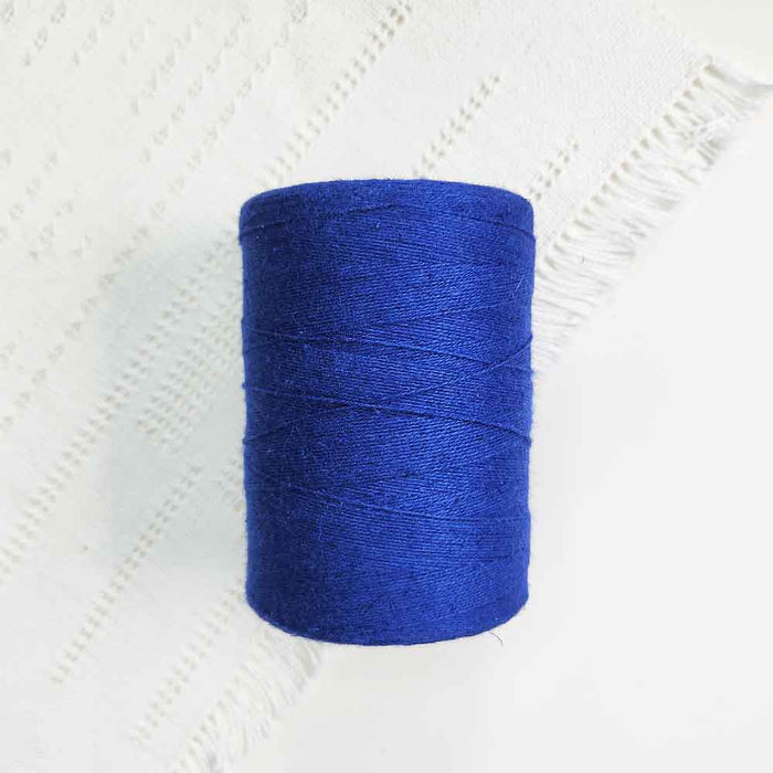 Cone of royal cotolin weaving yarn by Brassard