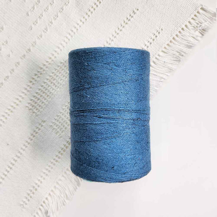 Cone of vieux bleu cotolin weaving yarn by Brassard