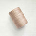 Beige 4/8 cotton weaving yarn cone by Maurice Brassard