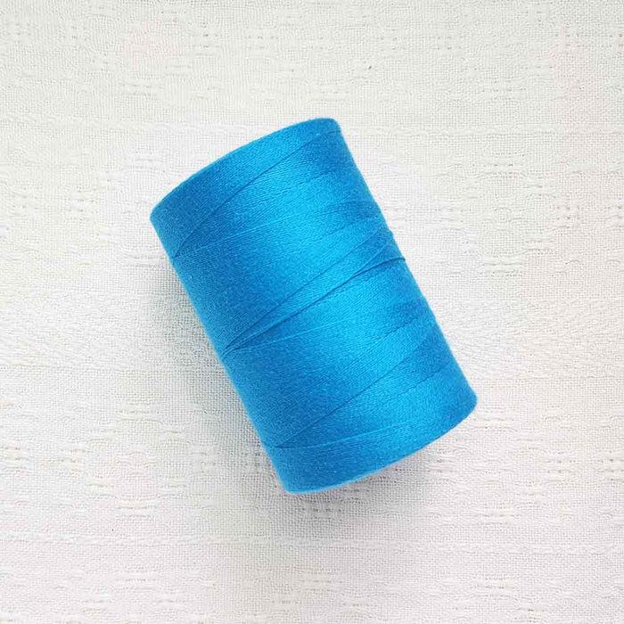 Bleu moyen 4/8 cotton weaving yarn cone by Maurice Brassard