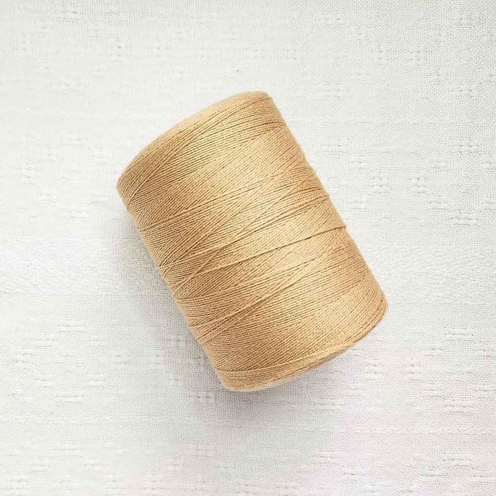 Honey 4/8 cotton weaving yarn cone by Maurice Brassard