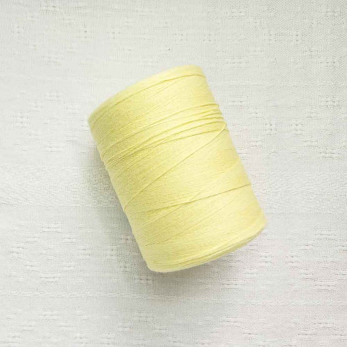 Jaune pale 4/8 cotton weaving yarn cone by Maurice Brassard