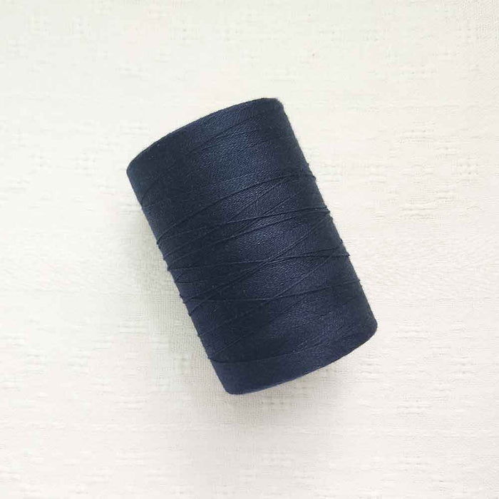 Navy 4/8 cotton weaving yarn cone by Maurice Brassard