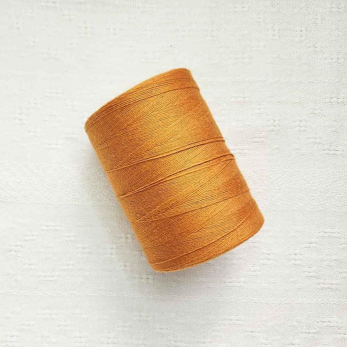 Orange brulee 4/8 cotton weaving yarn cone by Maurice Brassard