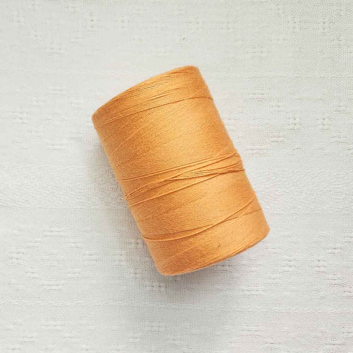Orange 4/8 cotton weaving yarn cone by Maurice Brassard