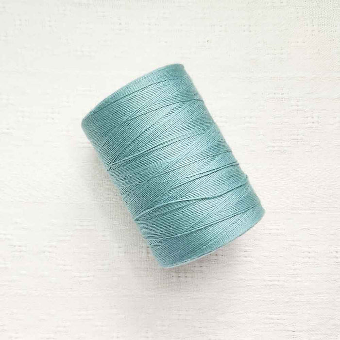 Teal 4/8 cotton weaving yarn cone by Maurice Brassard