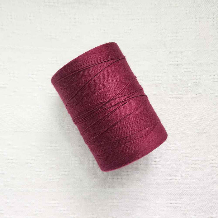 Wine 4/8 cotton weaving yarn cone by Maurice Brassard