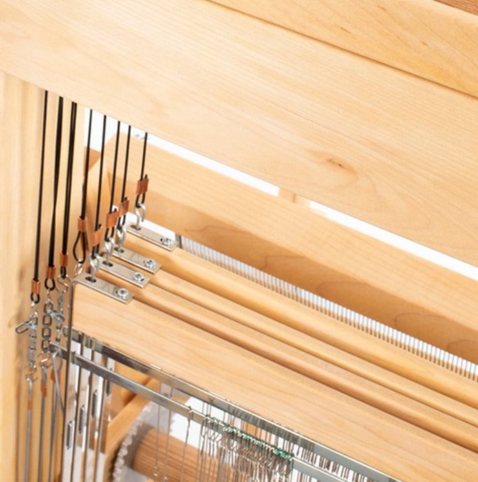 Close-up of reed and heddles on Harrisville Designs floor loom