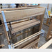 Lofty Fiber Helping Hands holding lease sticks for threading on a Harrisville loom