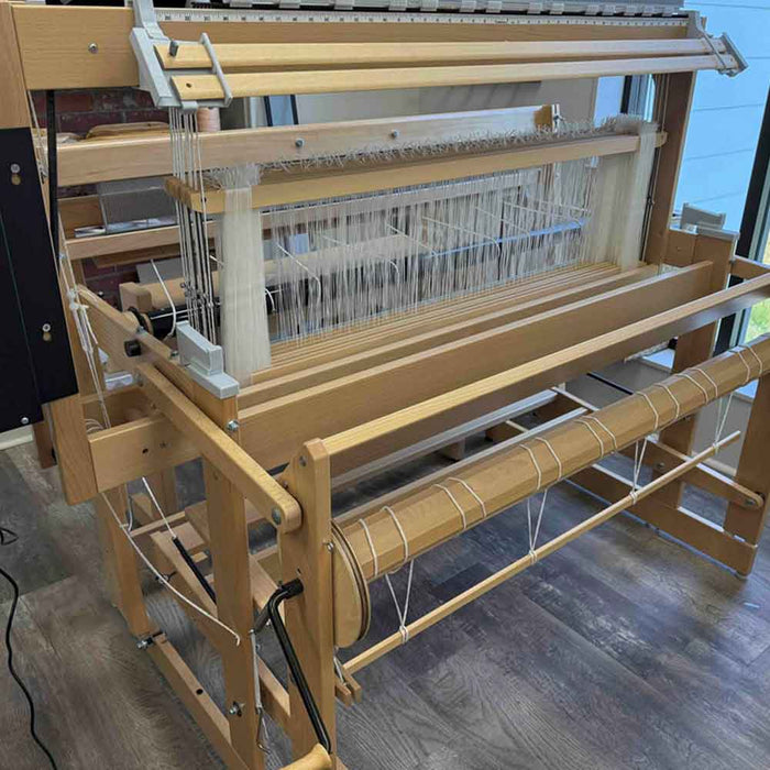 Lofty Fiber Helping Hands installed on a Louet Octado loom