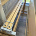 Helping Hands holding lease sticks on a Louet Octado loom