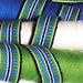 Blue and green handwoven bands made with an inkle loom