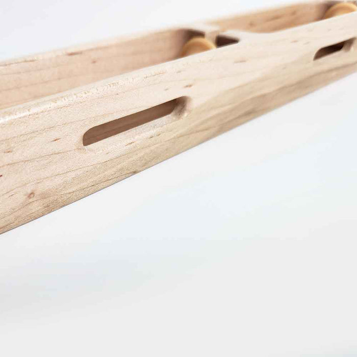 Detail view of Leclerc double weft shuttle designed to carry two weft threads