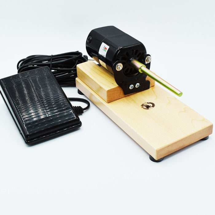 Leclerc electric bobbin winder with foot pedal, complete setup on wooden base — front view.