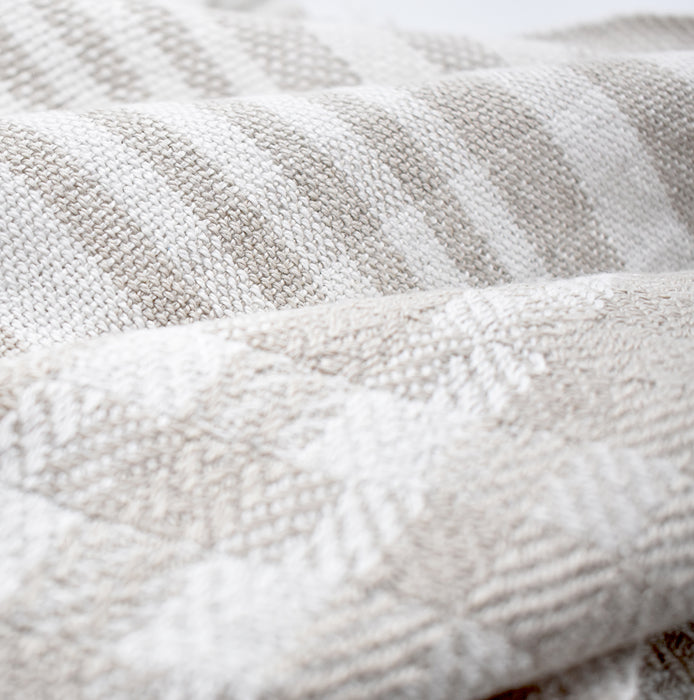 Handwoven linen dish towel showing contrasting stripe arrangement
