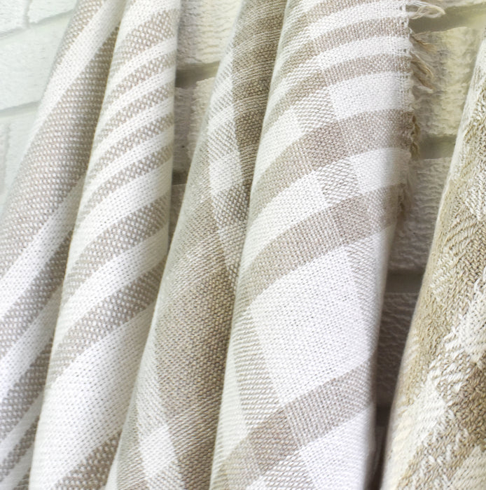 Close-up of handwoven linen dish towel with striped pattern