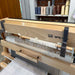 Lofty Fiber beater holder supporting loom beater during reed sleying