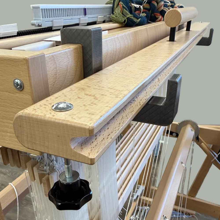 Louet loom beater held in position with Lofty Fiber beater holders