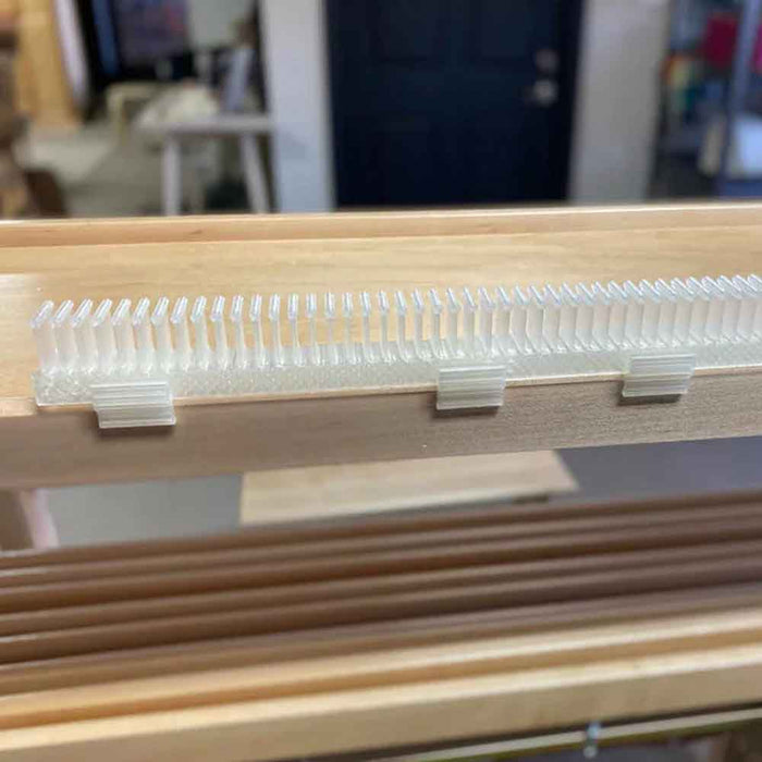 Close-up of a Lofty Fiber raddle mounted on a Leclerc loom