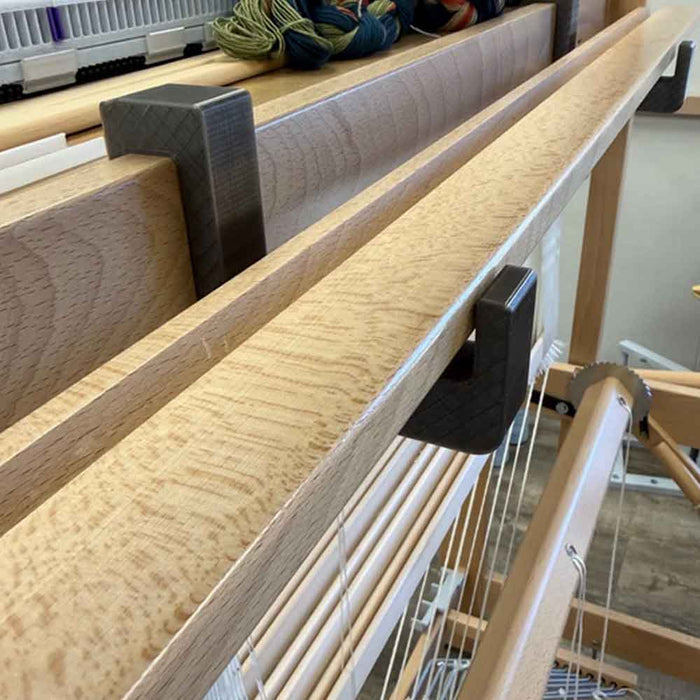 Close-up of Lofty Fiber beater support mounted on Louet loom