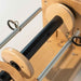 Official Louët bobbin for Jenn-E e-spinner – balanced wooden flyer bobbin compatible with IrT and ScT tension systems.